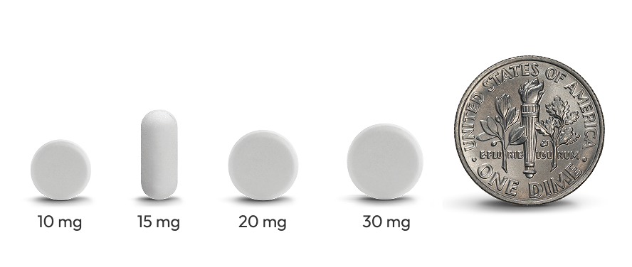 4 LIVMARLI tablets (10mg, 15mg, 20mg, and 30mg) with a dime for scale sitting to the right of them. All 4 tablets are smaller than the dime.